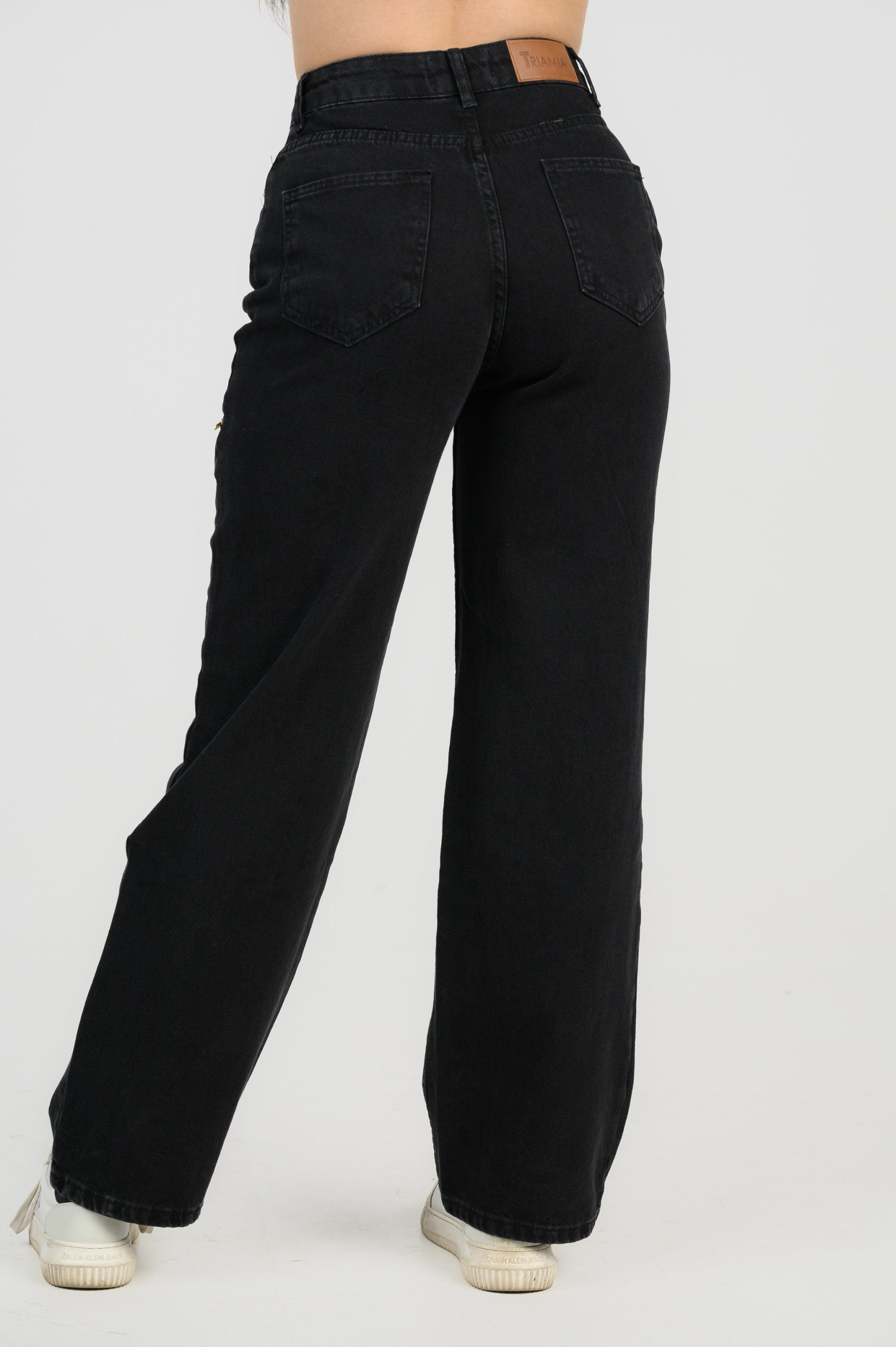 black jeans with zippers on thighs back side