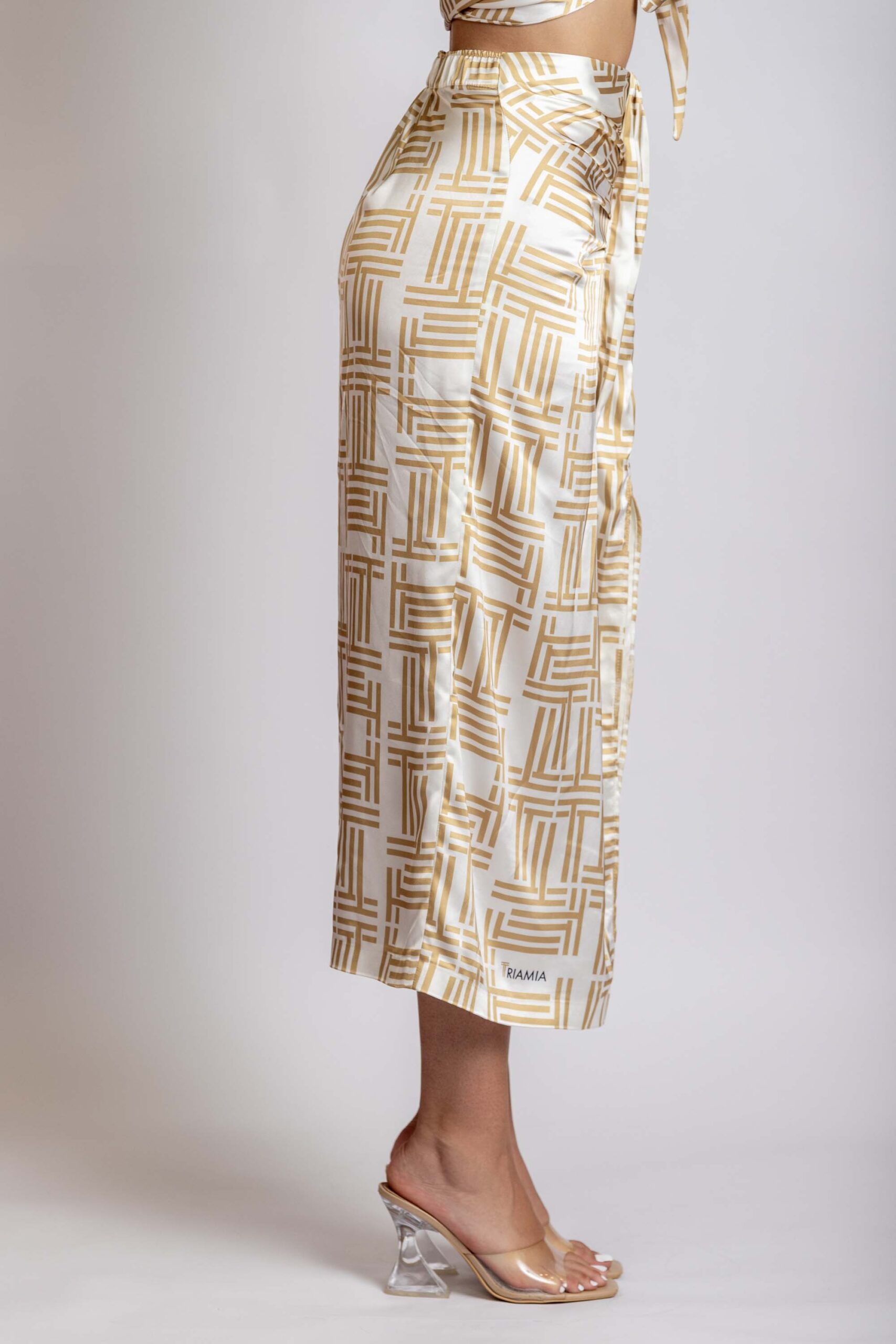 Midi Skirt with triamia logo print, side.
