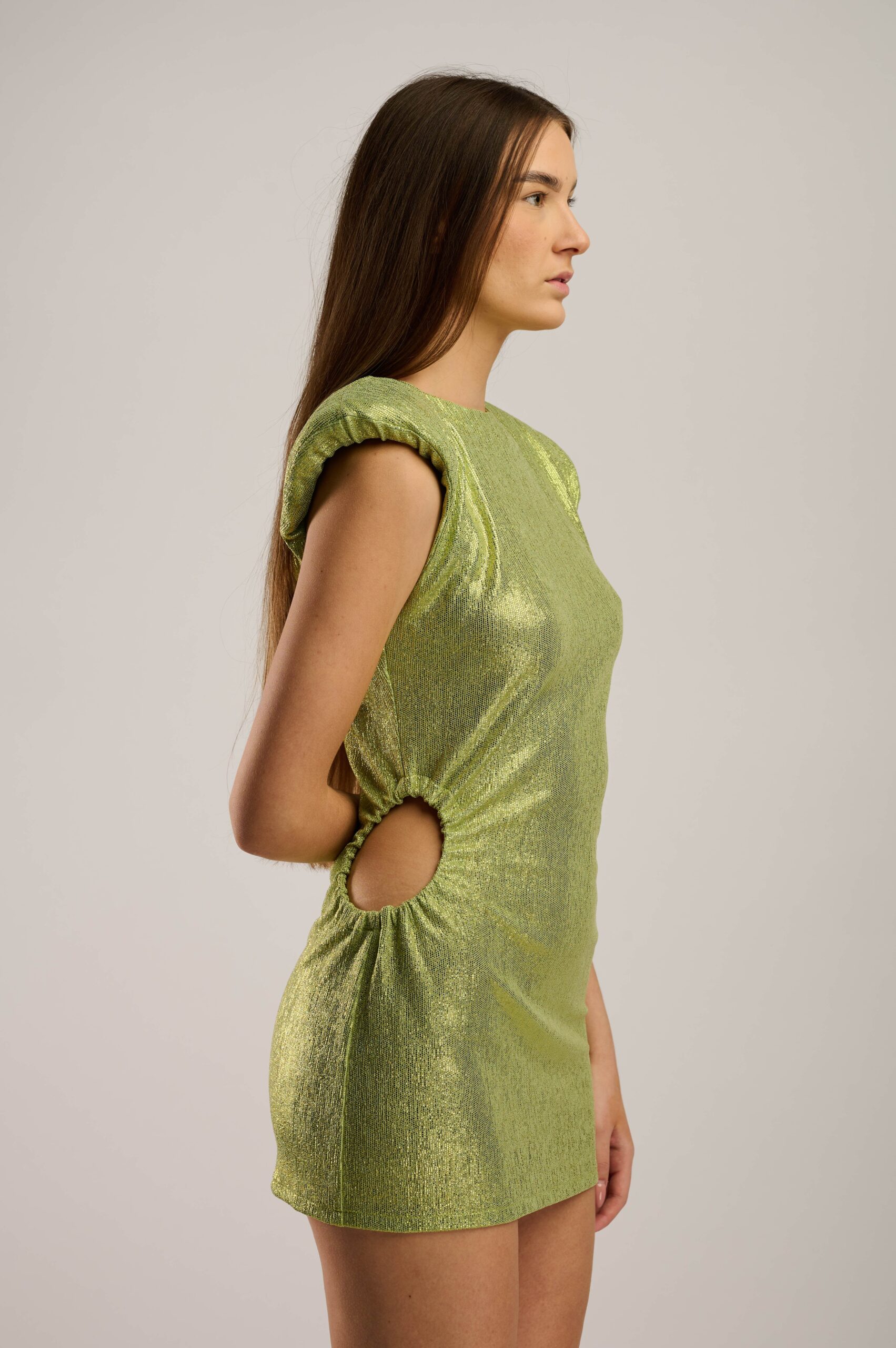 Sleeveless Light Green Foil Lurex Mini Dress with a cut-out detail on the waist and shoulder pads