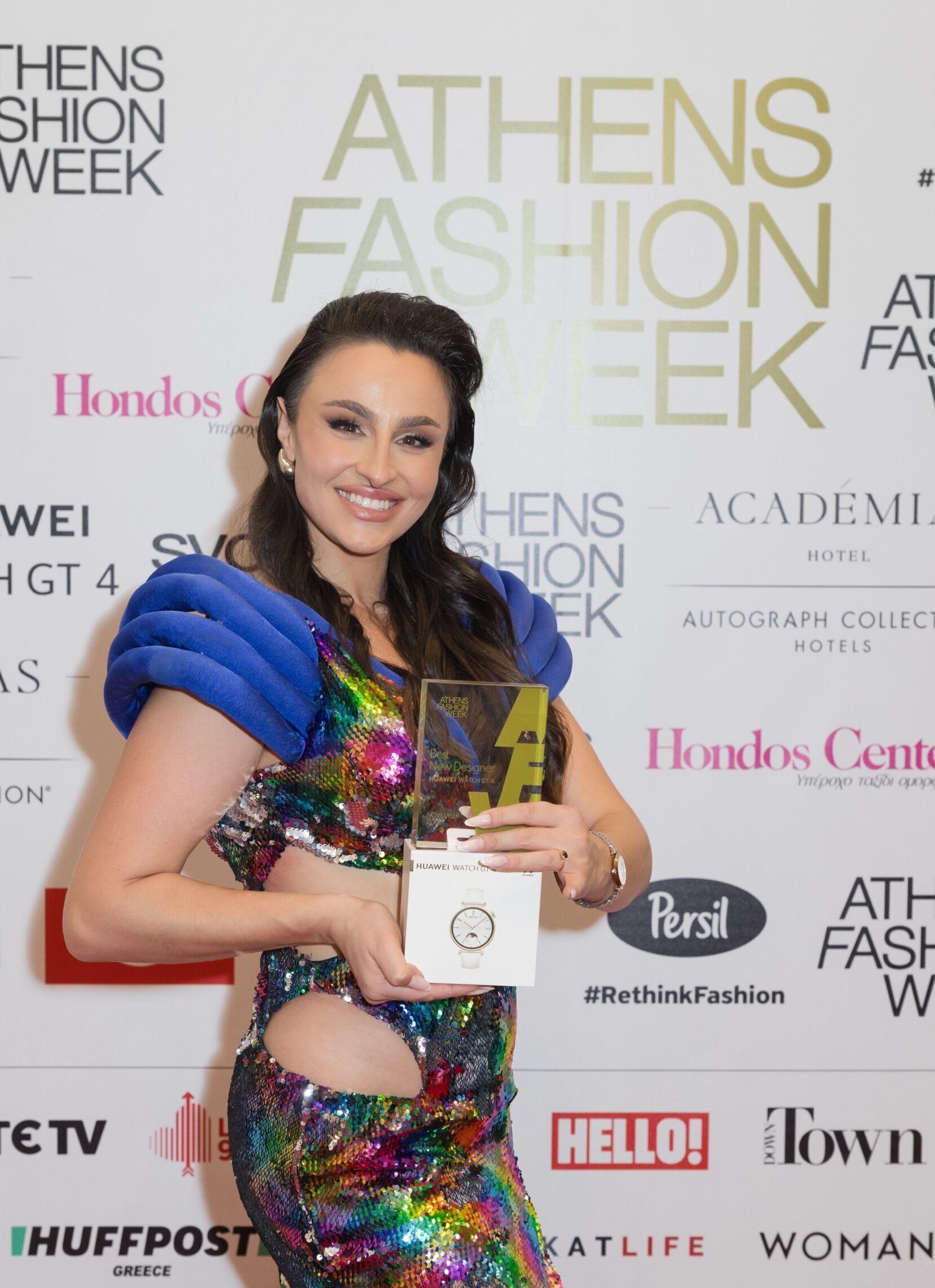 Owner of Triamia with the award she won at "Athens Fashion Week" as "Best New Designer".