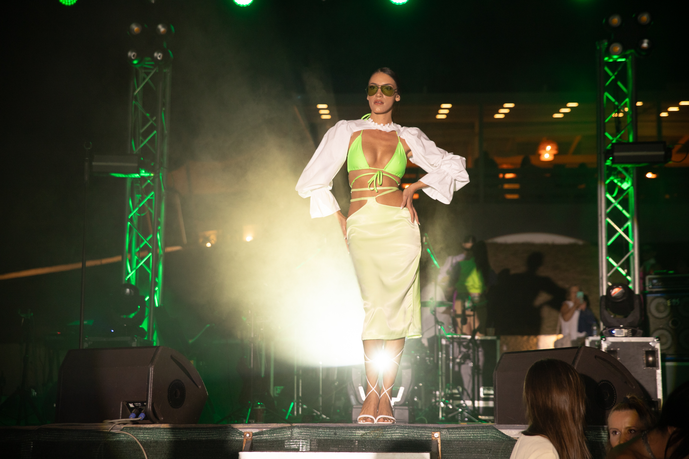 model posing in triamia's spring-summer collection at fashion show